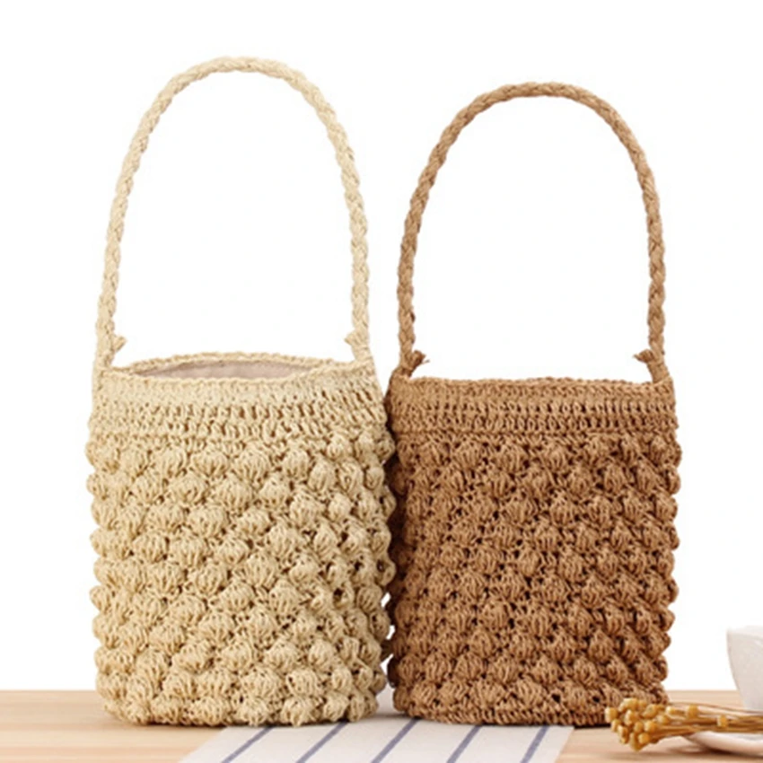 

British style new cylinder hand-carrying woven bag cute bucket straw bag seaside vacation leisure bag