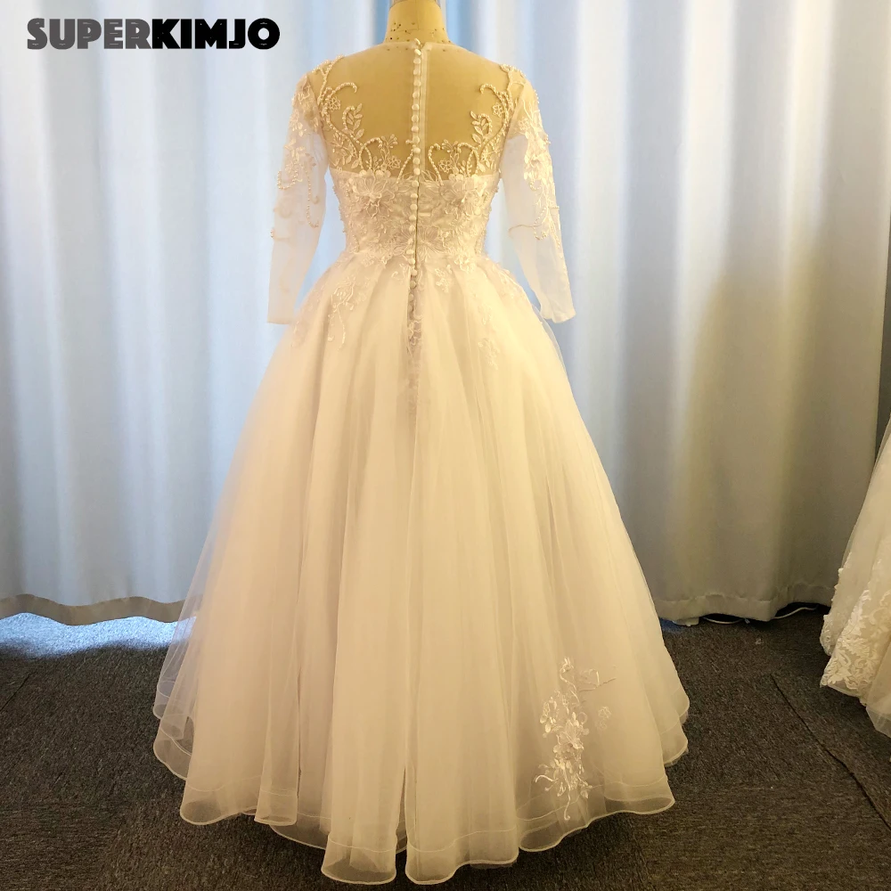 Vestidos de novia transparentes con cuello redondo, Apliques de encaje, flores hechas a mano, perlas, vestido de novia, 2020