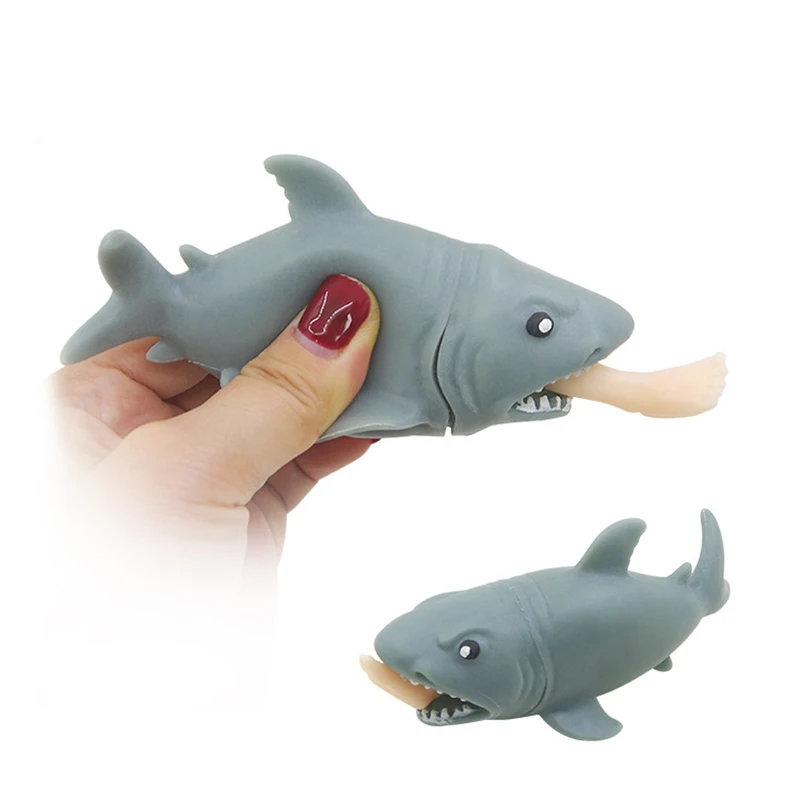 

1Pcs Hot Plastic Creative Anti Stress Squeeze Toys Hungry Shark With Pop Out Surfer Leg Toy Stress Relief Funny Spoof Trick Gift