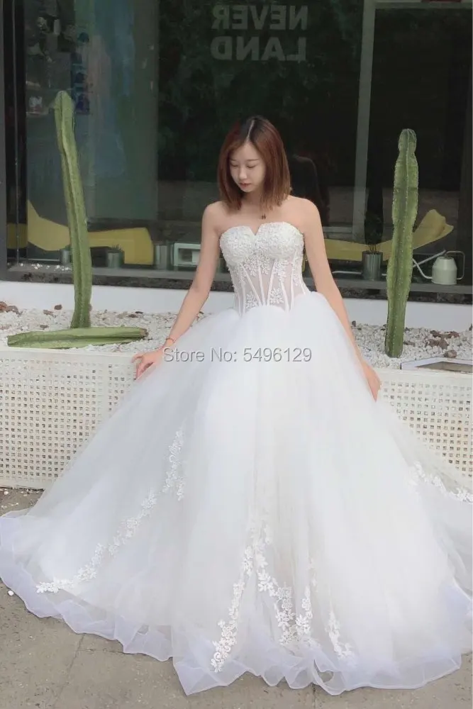 Elegant Tulle Lace Bodice A Line Wedding Dresses Sexy Strapless Sleeveless Sweep Train Bridal Gown 2023 Formal Bride Dress Ivory