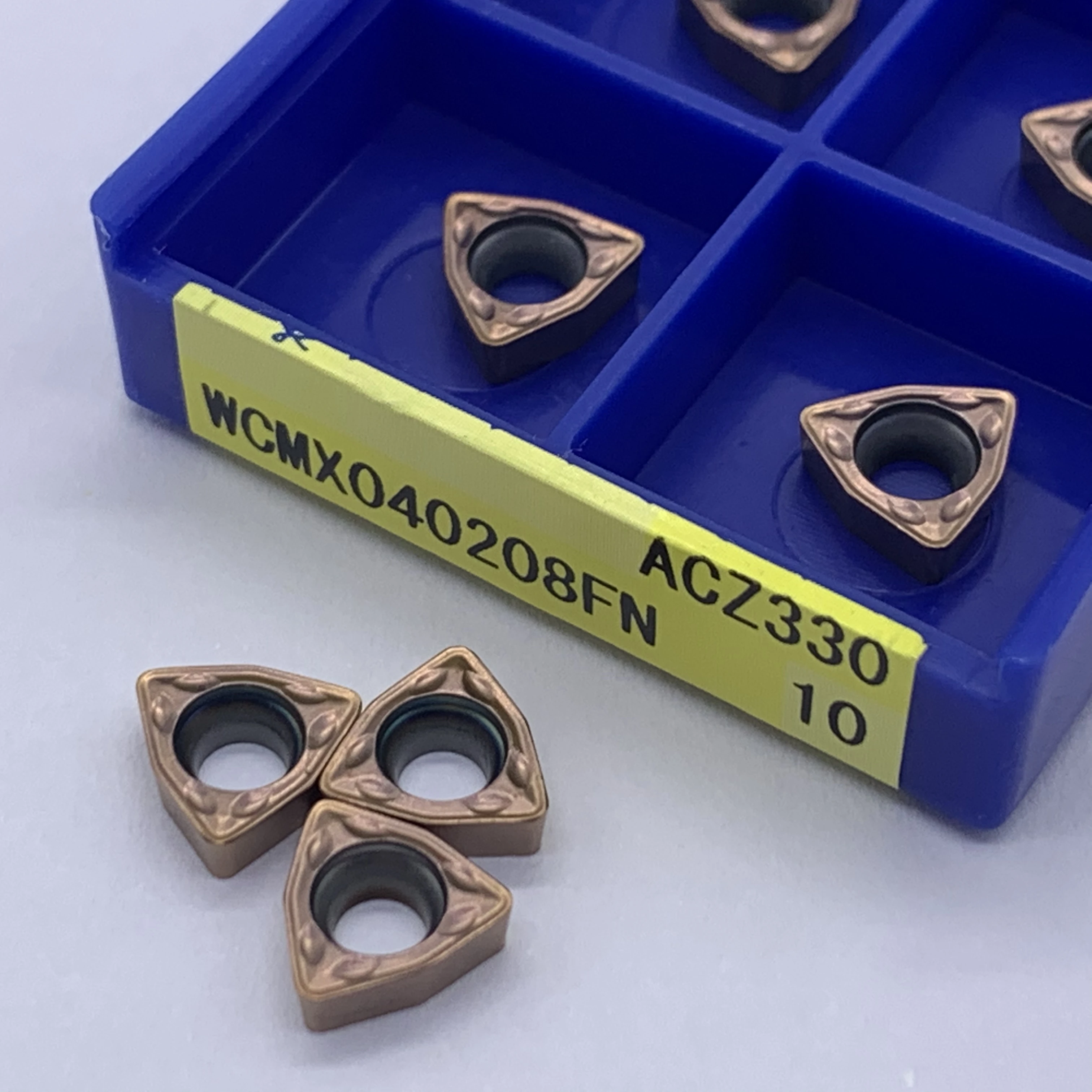 WCMX030208FN WCMX040208FN WCMT050308FN WCMT06T308FN WCMT080412FN كربيد أداة تحول إدراج آلة خرط تعمل بالتحكم الرقمي بواسطة الحاسوب