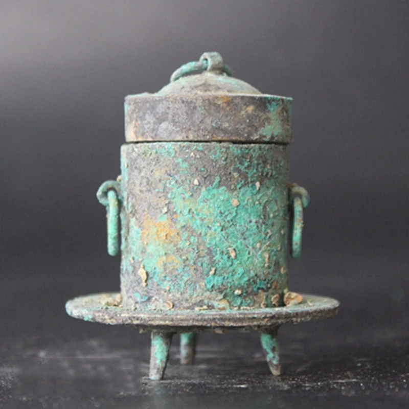 Collection of old Chinese bronzes, retro Han Dynasty utensils, small jars, three-legged small ornaments
