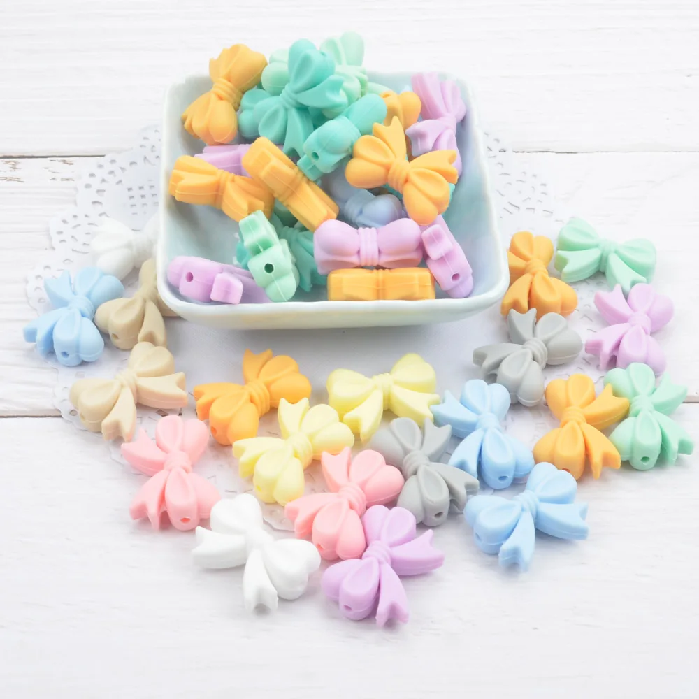 LOFCA 50pcs Bowknot Silicone Beads DIY Food Grade Silicone Teething Pacifier Cute Shaped Silicone teether Holder Accessories