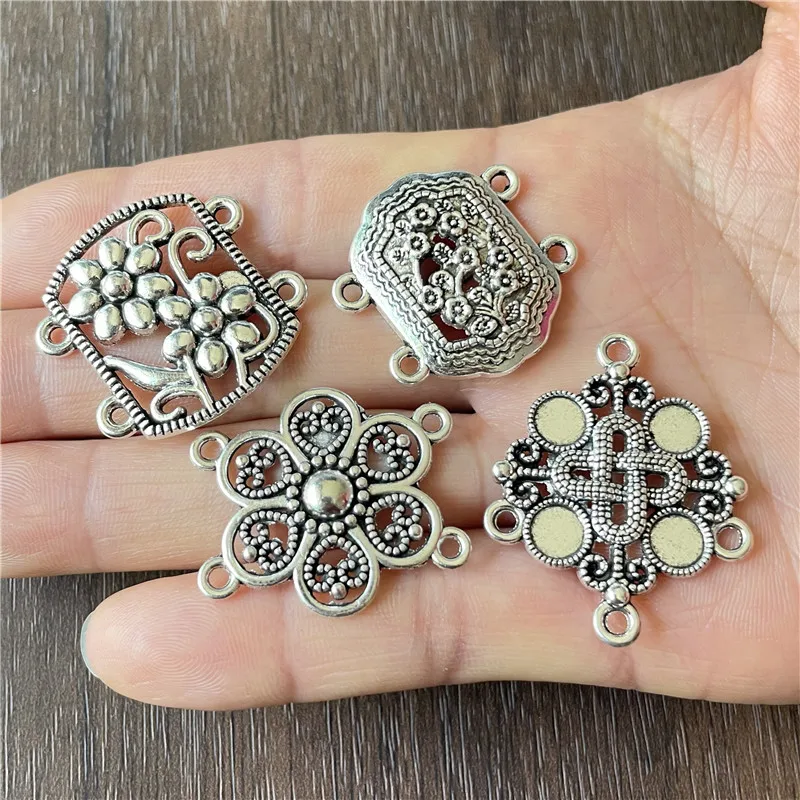 JunKang 10pcs antique silver bronze 4-corner flower-shaped dream catcher DIY handmade jewelry crafts feather buckle accessories