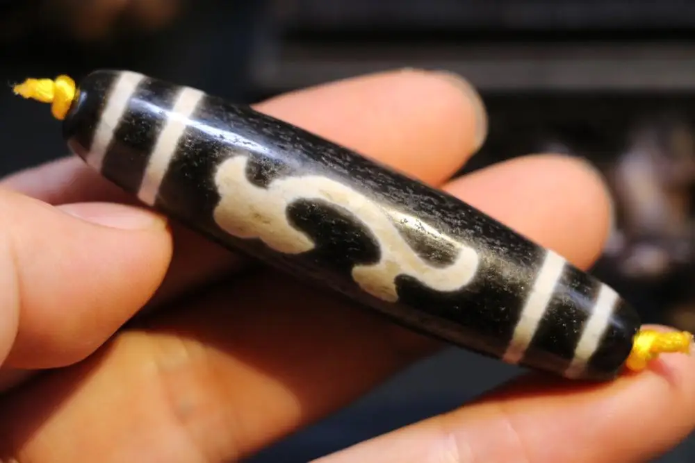 

Magic Power Tibetan Old Agate Black White Line Ruyi As You Wish Long dZi Bead Amulet From Timestown