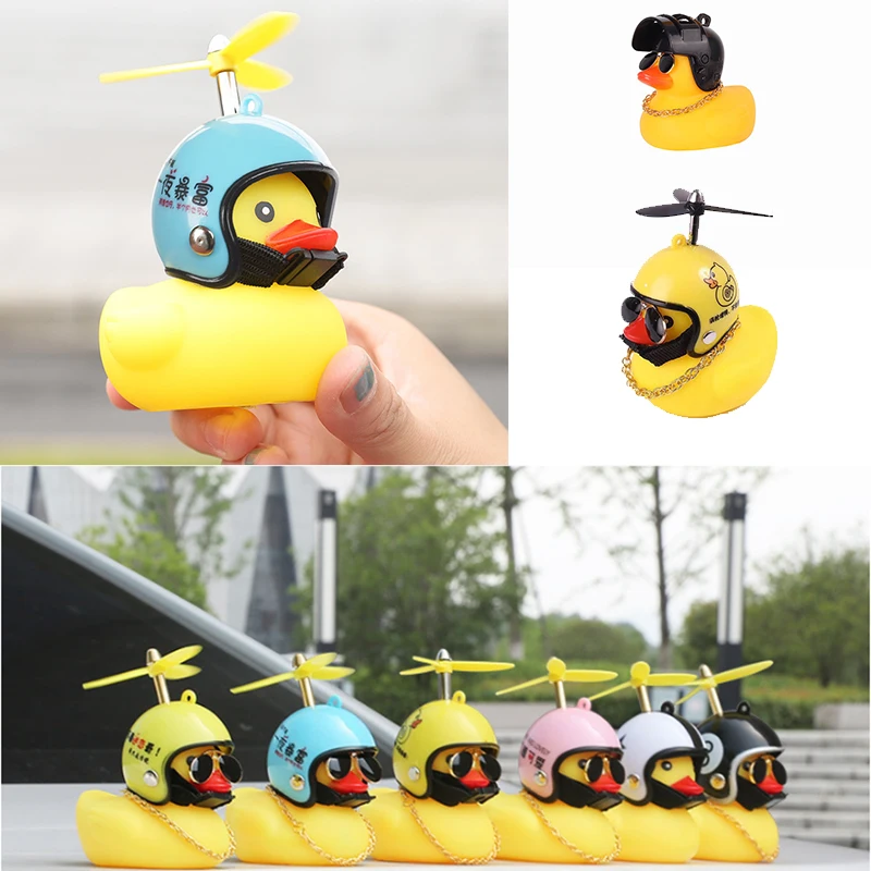 

Cute Little Black Yellow Duck With Helmet Propeller Rubber Windbreaker Duck Squeeze Sound Internal Car Decoration Child Kid Toy