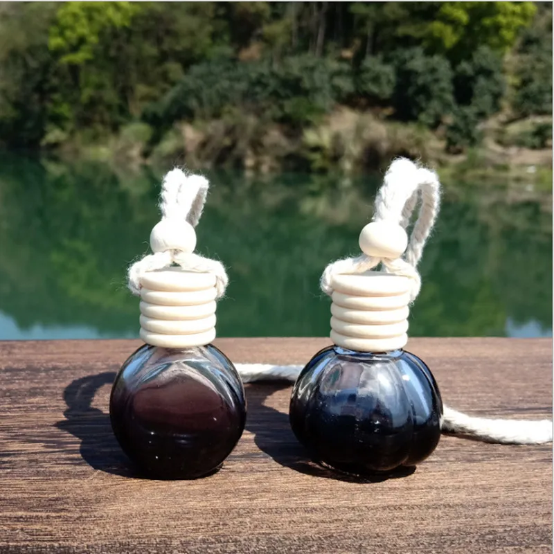 

Wholesale Black Car 8ml 15ml Hanging Empty Glass Perfume Bottles Pendant Car Ornament Auto Perfume Container