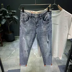 Ripped Denim jeans 2021 men's trendy brand loose summer thin elastic feet pants men's Korean harem teenagers cropped pants