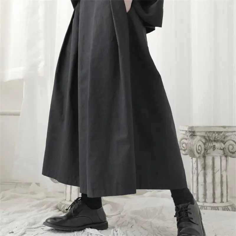 

Ladies Pant Skirt Spring And Autumn New Solid Color Irregular Super Loose A-Word Skirt Design Wide Leg Pants