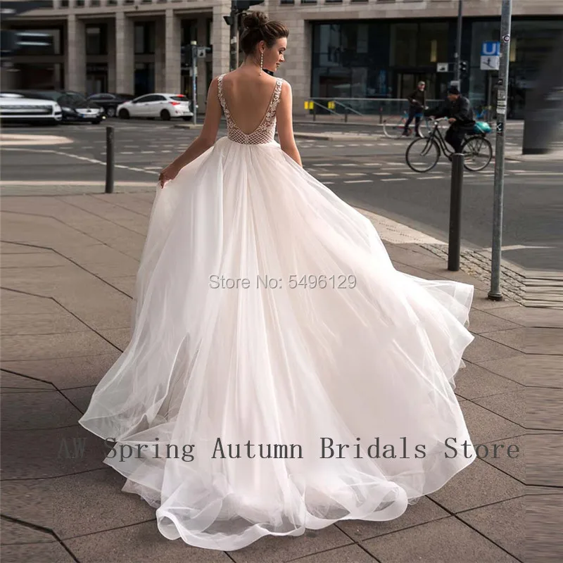 Amazing Nude Tulle V Neck Beading Wedding Dresses Sexy Backless Lace Appliques A Line Bridal Gowns Sleeveless Vestidos de Noiva