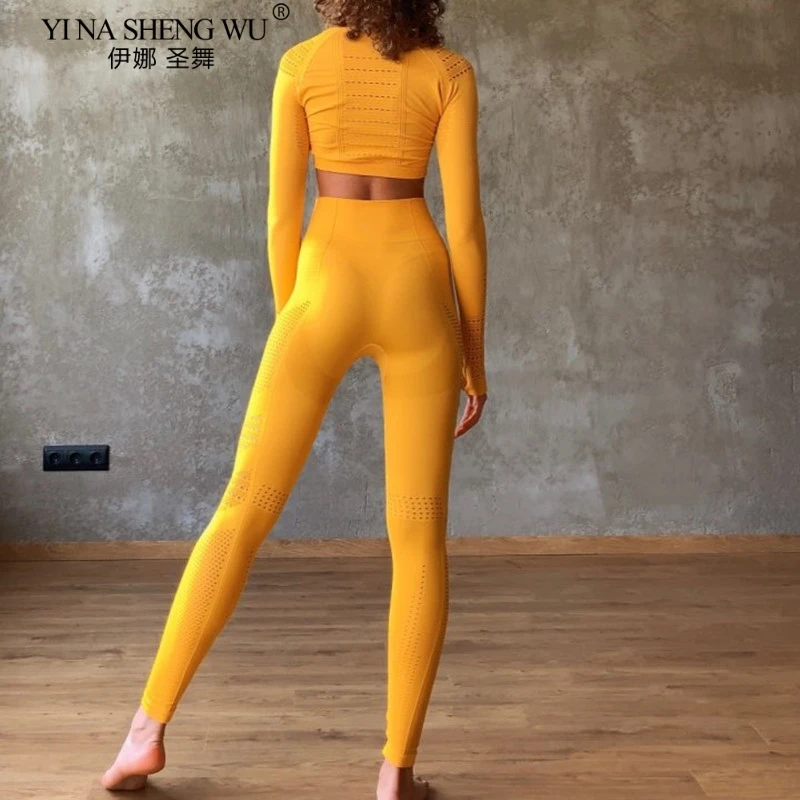 Nuova tuta sportiva da donna vitale Set da Yoga abiti da allenamento per palestra manica lunga Fitness Crop Top + Set di Leggings senza cuciture a