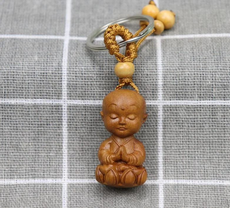 Hot Selling Peach Wood Carved Shakyamuni Buddha Keychain Pendant Wooden Guanyin Bodhisattva Gift Pendant Buddha Keychains