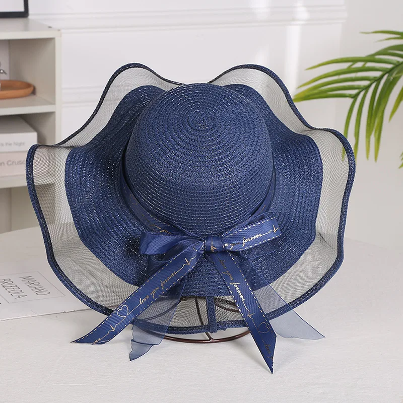 Sombrero plegable de paja con lazo para niña y mujer, sombrero de paja flexible con ala grande, elegante, protección contra la sombra, a la moda,