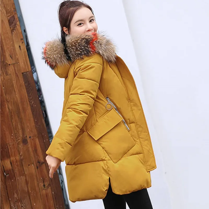 UHYTGF Winter Jacket Women Parka Fashion Fur Hooded winter coat women Thicken Warm Down Cotton female Park jacket Loose Size 581