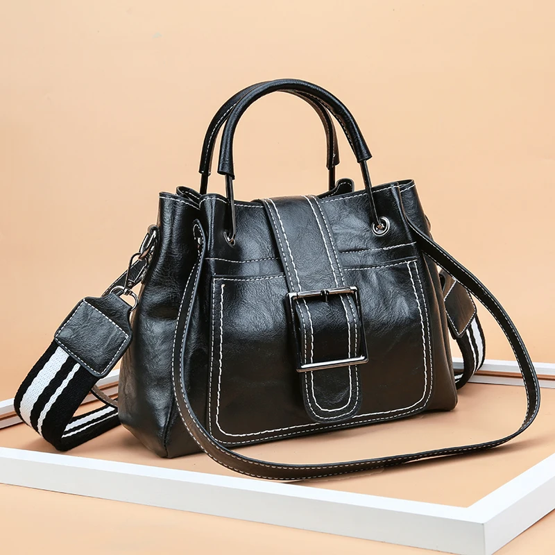 Our shop hot style women\'s bag 2021 new oil leather iron thick thread bucket bag one shoulder cross-slung handbag S7