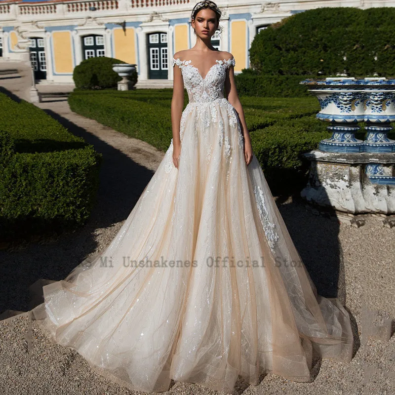 Robe de Mariage abito da ballo Champagne abito da sposa 2021 abiti da sposa in pizzo treno lungo chiesa Chic abiti da sposa manica a cappuccio