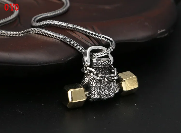 

2021 new style 925 sterling silver jewelry retro dyed black Thai silver sports fist dumbbell pendant