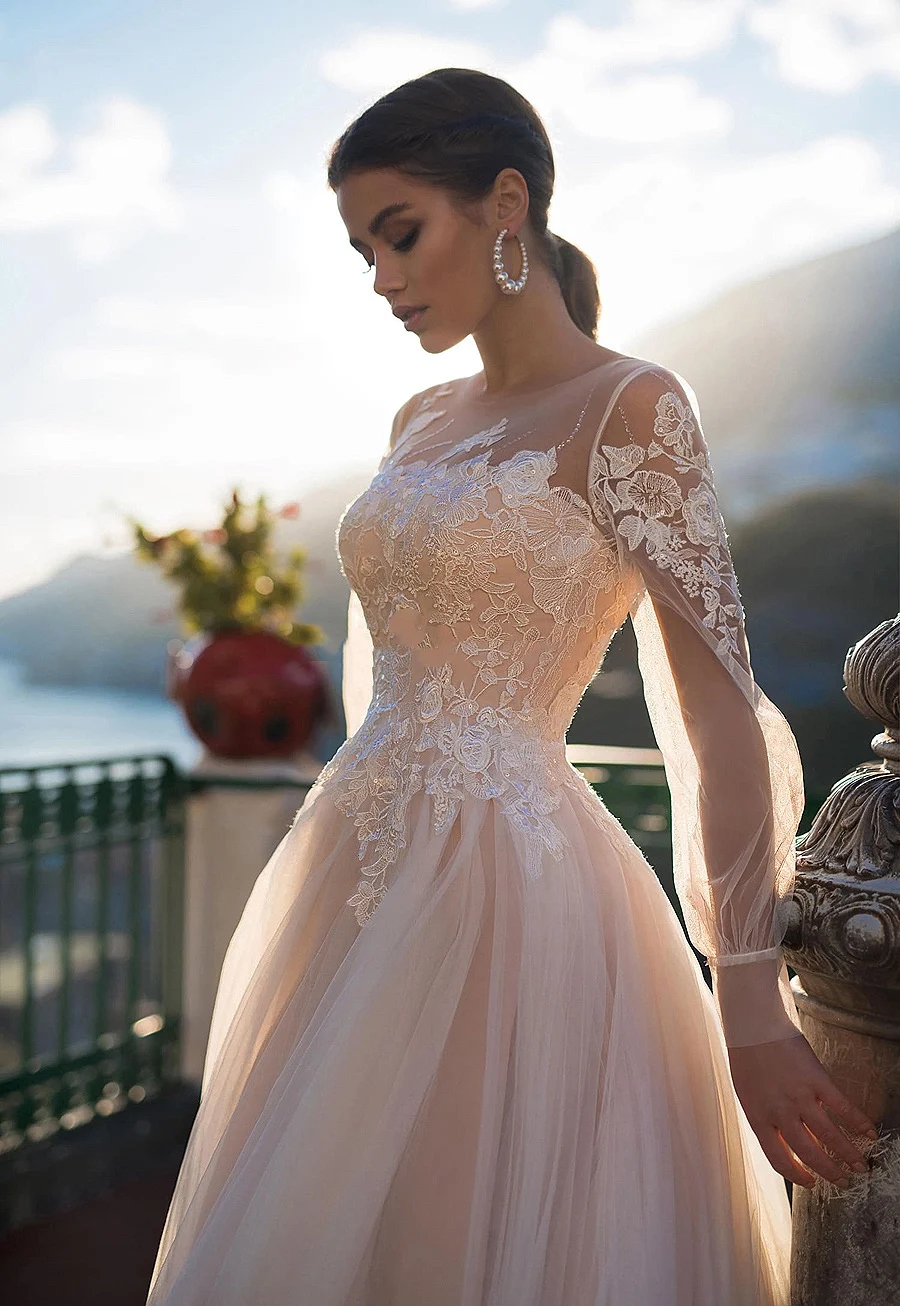 Una linea abiti da sposa Vestido De Noiva Mariage Beach maniche lunghe A sbuffo Appliques di pizzo bottoni con lacci abiti da sposa