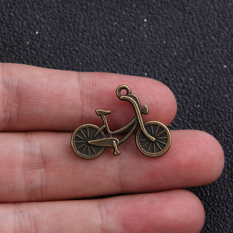 10pcs/lot 19*26mm Wholesale Vintage Bronze Alloy Metal Mini Bicycle Charm Jewelry Pendants Makings