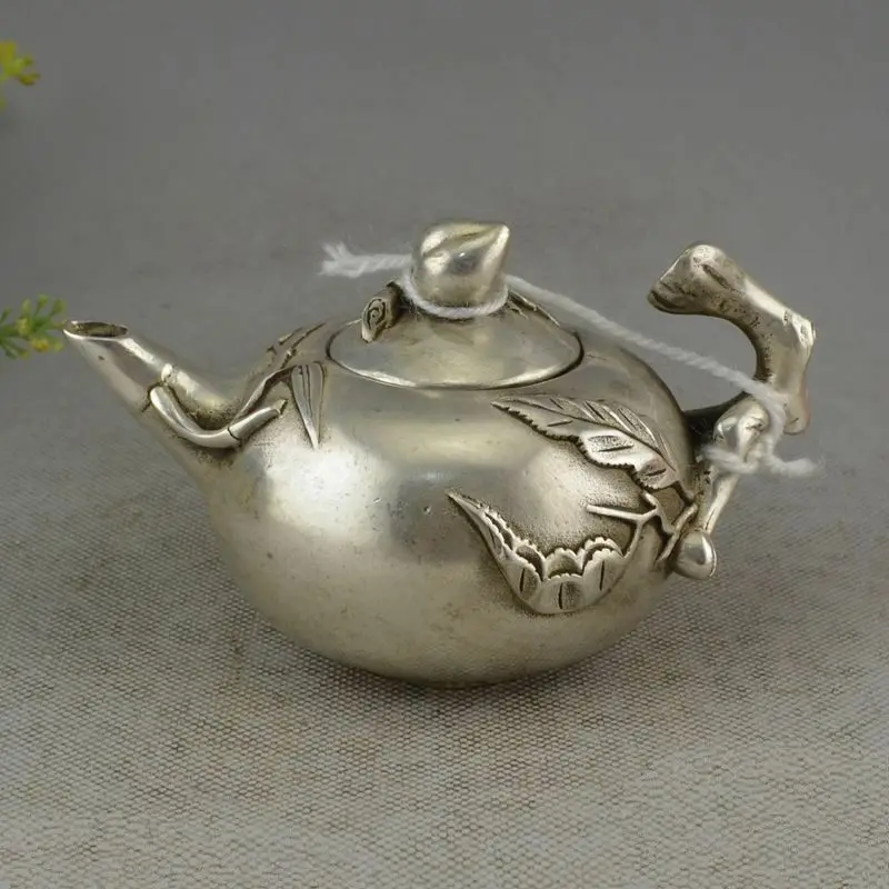 

Chinese Decorative Miao Silver Carving Technology Unique Peach Teapot