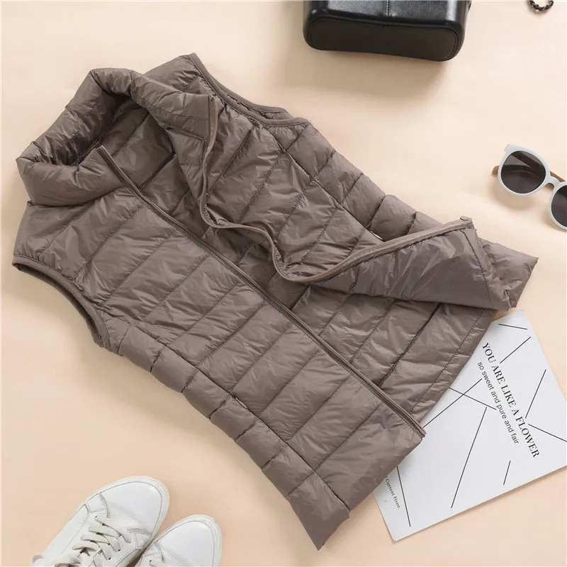 Chaleco corto de invierno para mujer, chaqueta gruesa sin mangas de estilo coreano sólido, con cuello levantado, acolchada de algodón, prendas de vestir informales, 2022