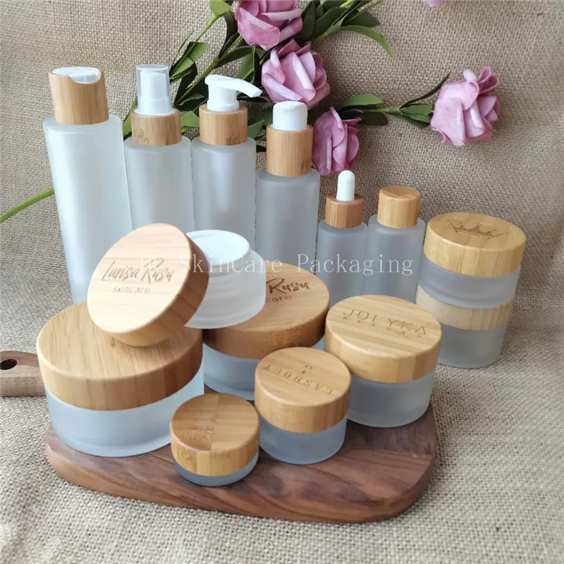 Wholesale Custom Logo Matte Glass Container Bottle Frosted Pot For Cosmetics Serum Face Eye Cream Jar With Bamboo Lid