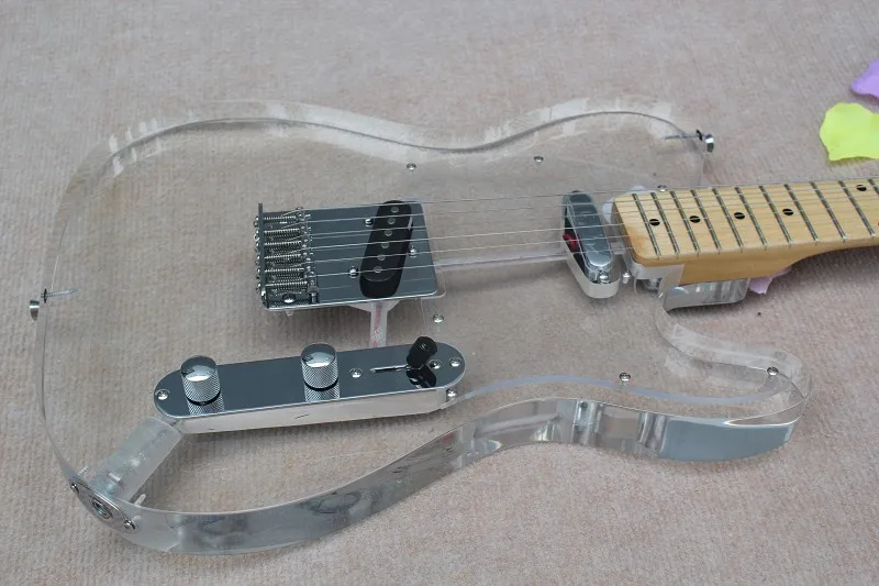 Acrylic guitar,6 string transparent crystal guitar, fixed tremolo bridge,HH pickup,Chrome buttons，maple neck