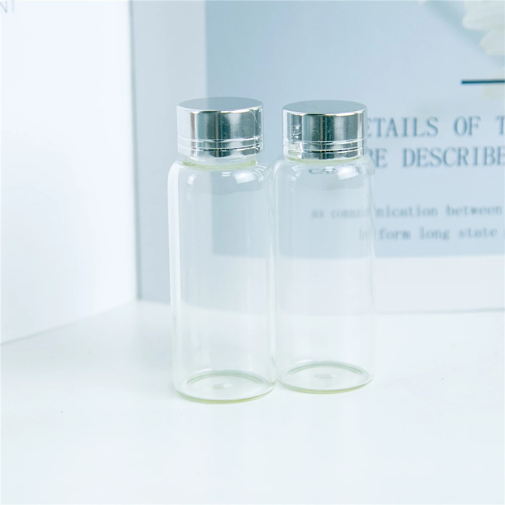 50Pcs 25ml Transparent Bayonet Glass Bottles Spiral Plastic Cap with Silver Tangent Mini Craft Vials Refillable Candy Food Pot