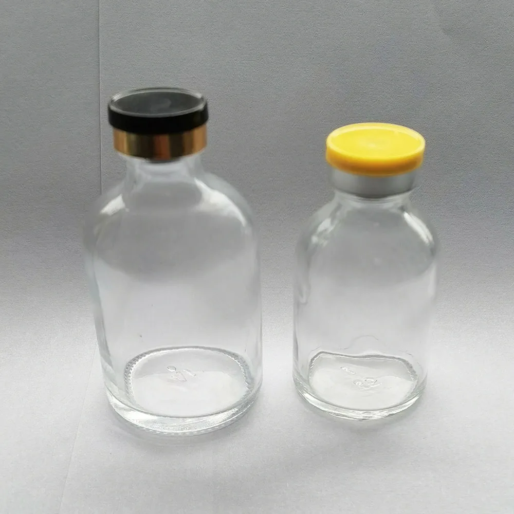 Pusta 100ML 50ML 30ML przezroczysta szklana fiolka do wstrzykiwań z plastikową aluminiową nakrętką 1 uncja przezroczyste szklane pojemniki na leki w płynie
