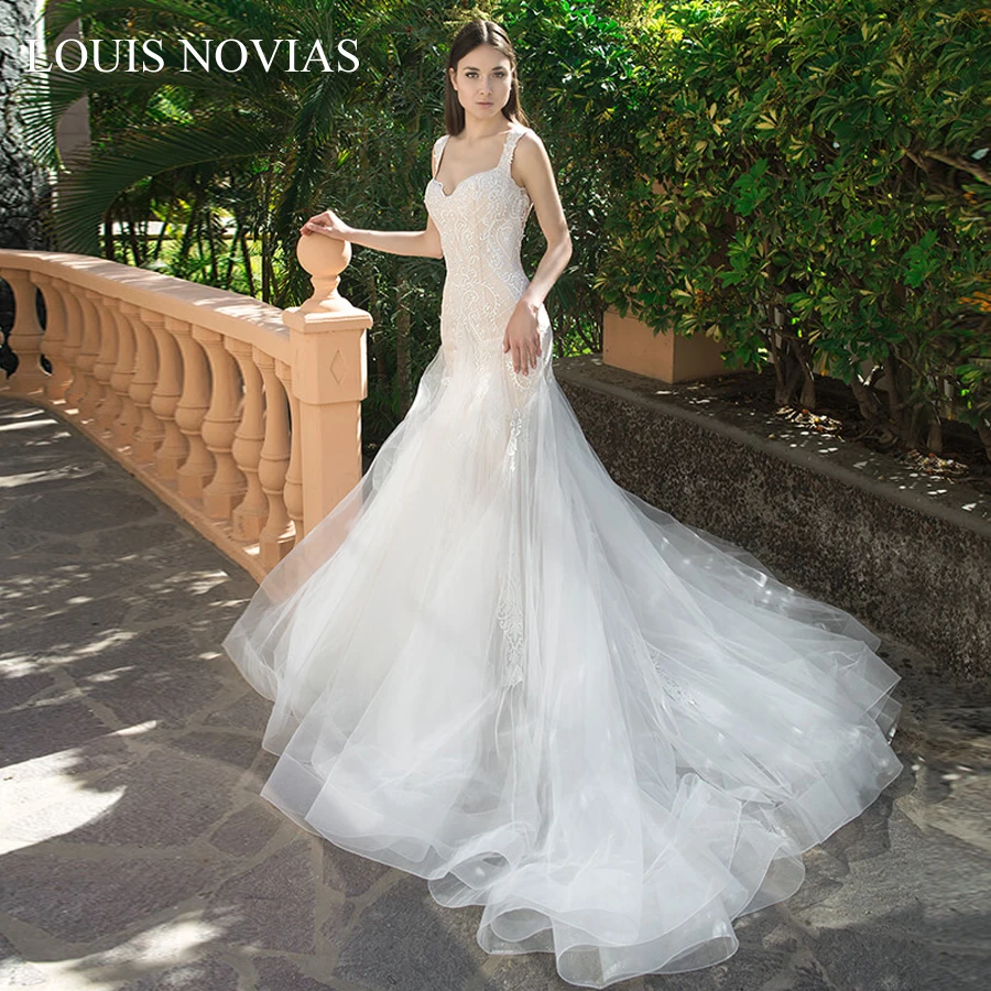 

Louis Novias Wedding Dresses Exquisite Embroidery Wedding Frocks White Lvory Illusion Backless Appliquese Mpire Tulle