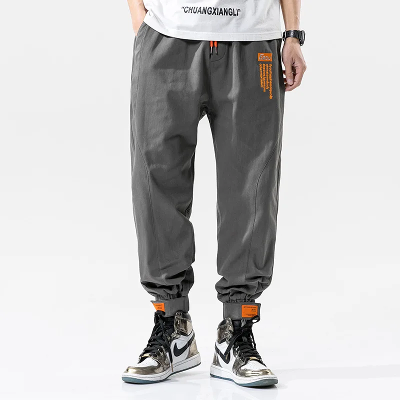 

2021 New Casual Loose Cargo Pants Men Fashion Hip Hop Harem Pants Korean Streetwear Elastic Waist Man Fitness Joggers Sweatpants