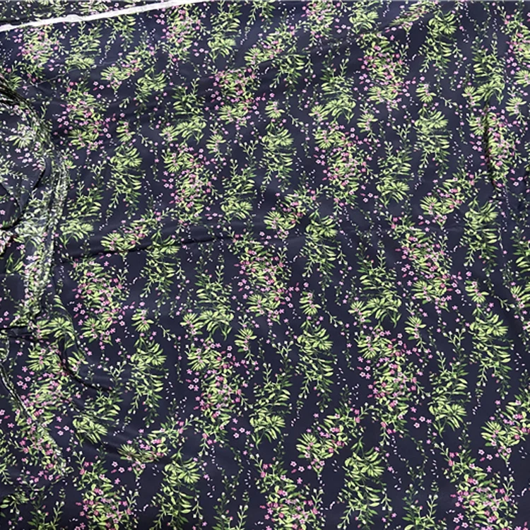 Pure silk crepe de chine fabric green leaves and floral print on navy blue bottom,SCDC1231