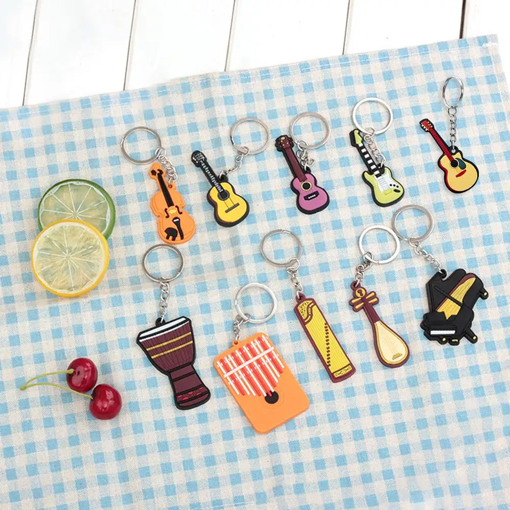 Creative musical instrument drum keychain guitar ukulele guzheng Kalimba piano pendant