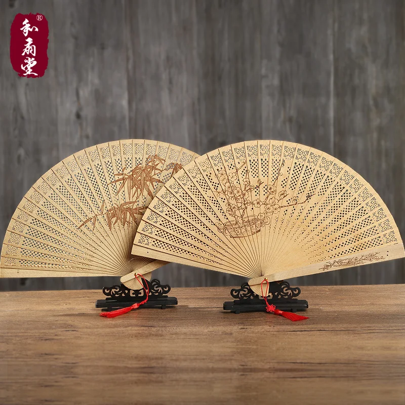 |He fan Tang fan 7-inch imitation sandalwood fan Burmese wood fan gift fan Hangzhou West Lake craft folding fan