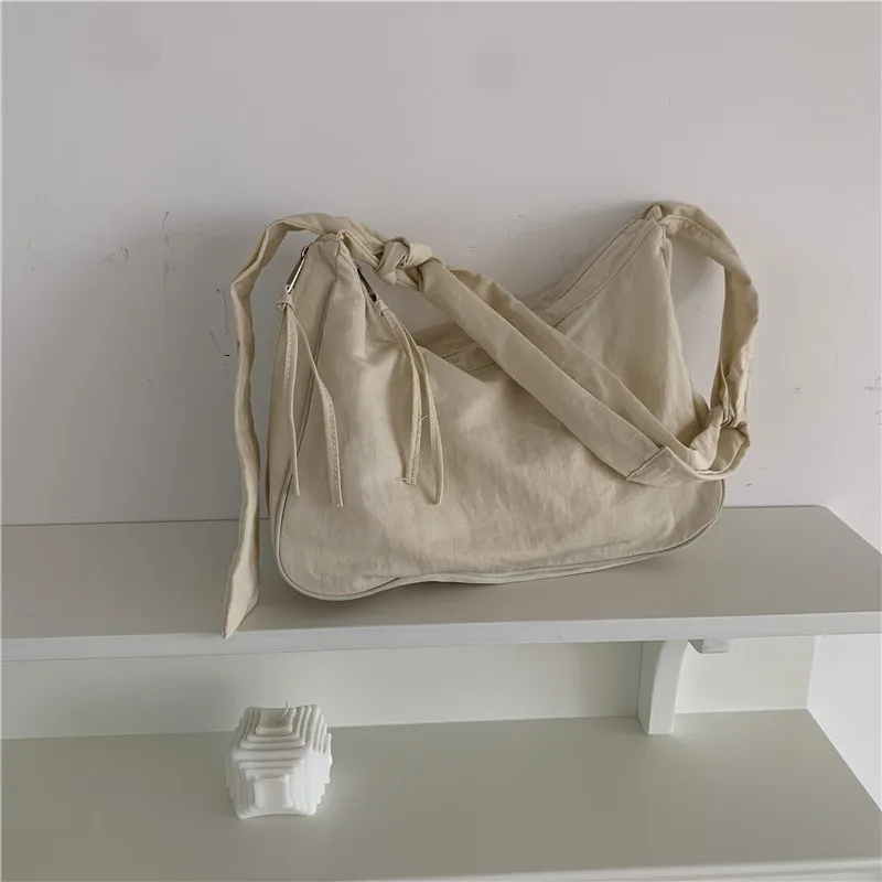 

Bag women's autumn and winter 2021 new shoulder diagonal nylon square bag strap fashion jiaozi bag retro shopping bag tide