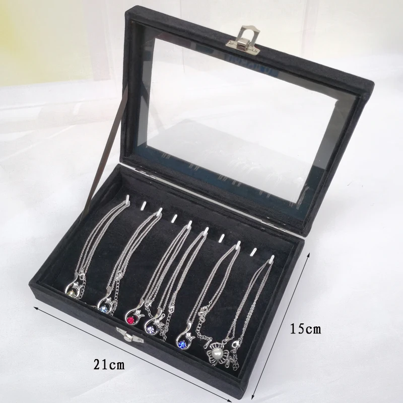 Joyero negro con cubierta de franela, caja pequeña arqueada para guardar y collares pulseras