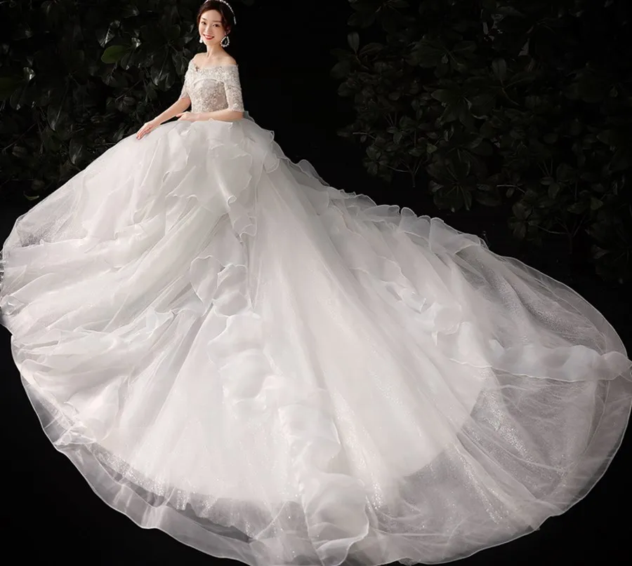 Abito da sposa di lusso fatto a mano elegante scollo a barchetta mezza manica abito da ballo pizzo fiore perline Vestido De Noiva Plus Size su misura