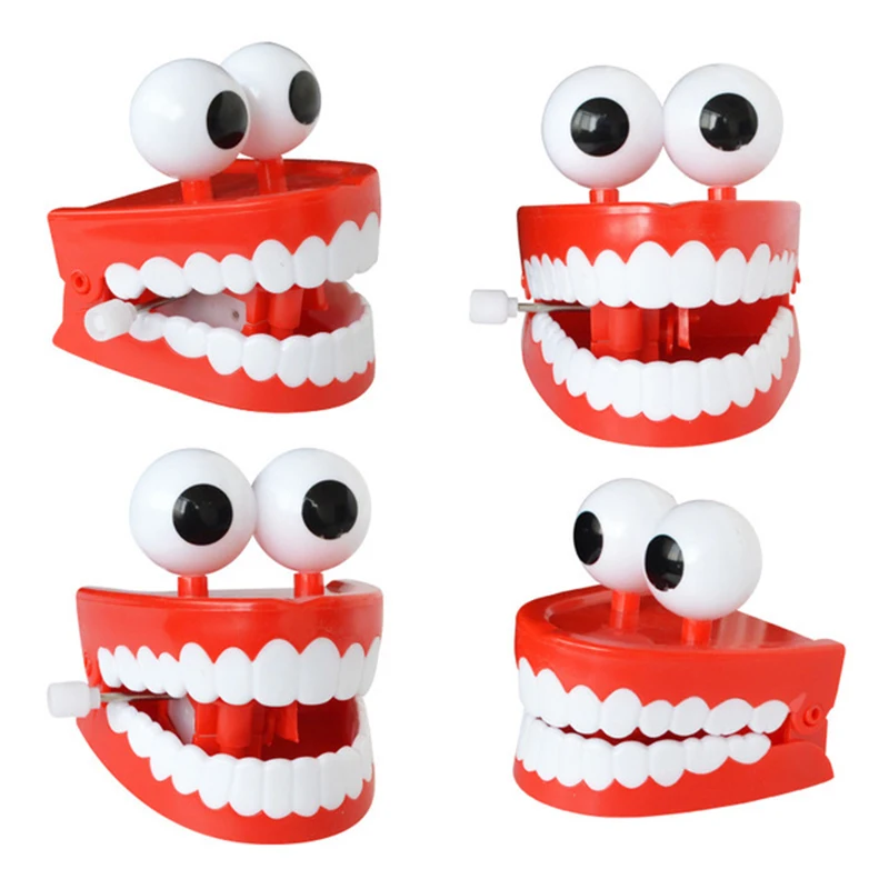 Red classic clockwork chattering teeth toy