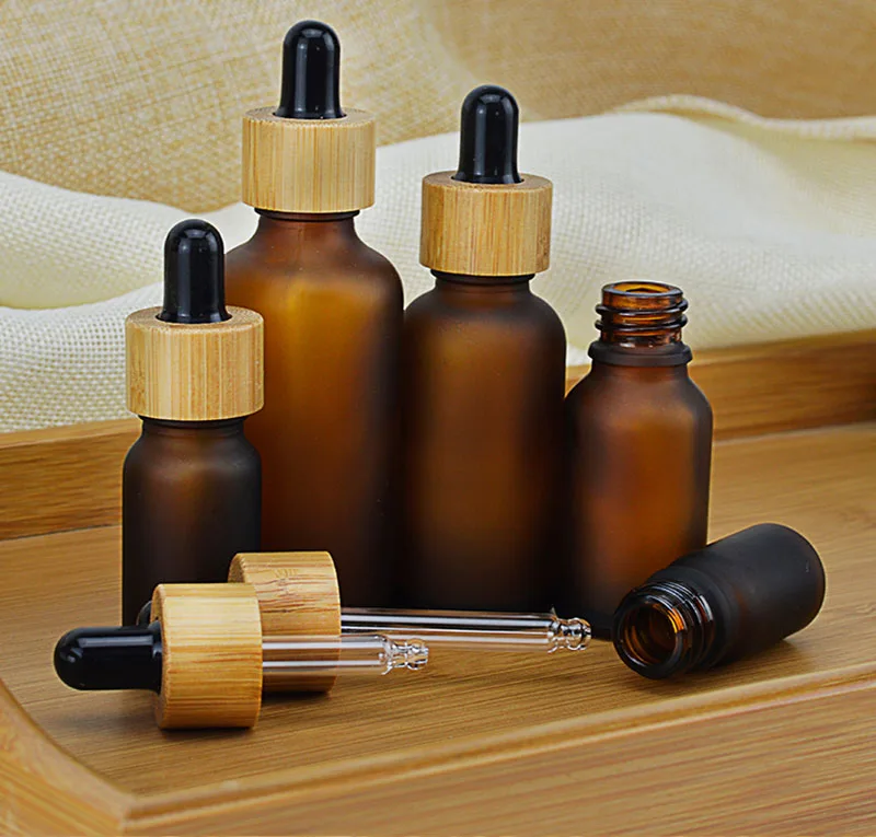 

5 10 15ml 30ml 50ml Frosted/ Clear Amber Glass Dropper Bottle with Bamboo Cap 1oz Essential Oil Bottles