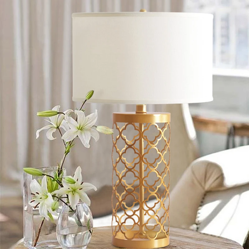 

American Golden Wrought Iron Hollow Pattern Livingroom Table Lamp Luxury Bedroom Bedside LED E27 Beige Cloth Cover Desk Lighting