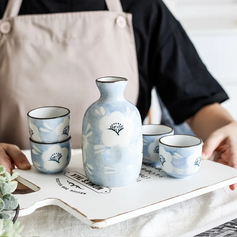 Juego de vino de flores azules, juego de Sake japonés, olla de vino de cerámica con taza para beber, juego de Bar, 1 olla + 4 tazas