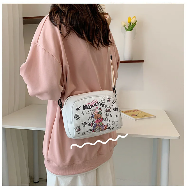 

Women's Fashion Canvas Small Square Bag Korean Fashion Multifunctional Cute Animal One-shoulder Diagonal Mobile Phone Package