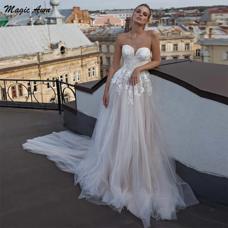 Magic Awn 2021 abiti da sposa da spiaggia Appliques di pizzo Champagne Illusion Sweetheart Boho A-Line abiti da sposa Princess Robe Mariage