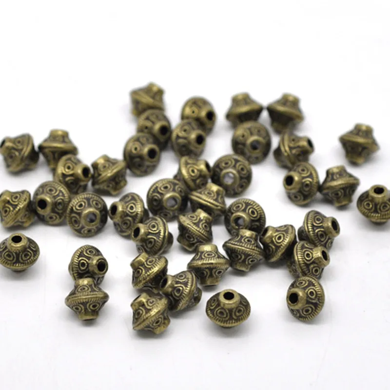 DoreenBeads Zinc Alloy Spacer Beads Bicone Antique Bronze Carved DIY Making Jewelry About 6mm x 6mm, Hole:Approx 1.6mm, 20 PCs