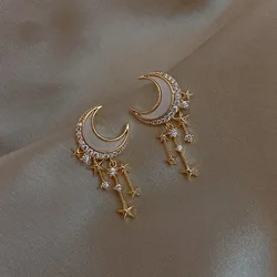 Eleganti orecchini pendenti a forma di stella di luna in acrilico per le donne temperamento unico geometrico Color oro metallo moda Pendientes regali carini