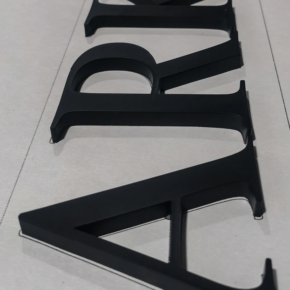 Letras de corte plano de acero inoxidable de 3mm con pintura negra