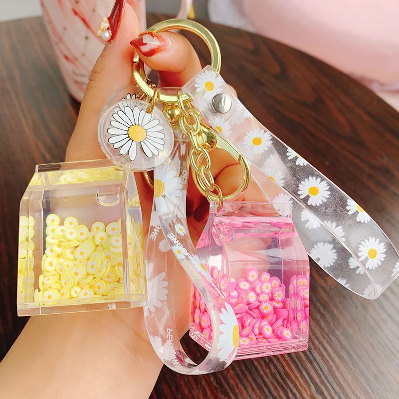 2022 Creative Cute Daisy Fruit Milk Bottle Keychain Floating Moving Liquid Quicksand Drift Bottle Keyring For Women Bag Pendant