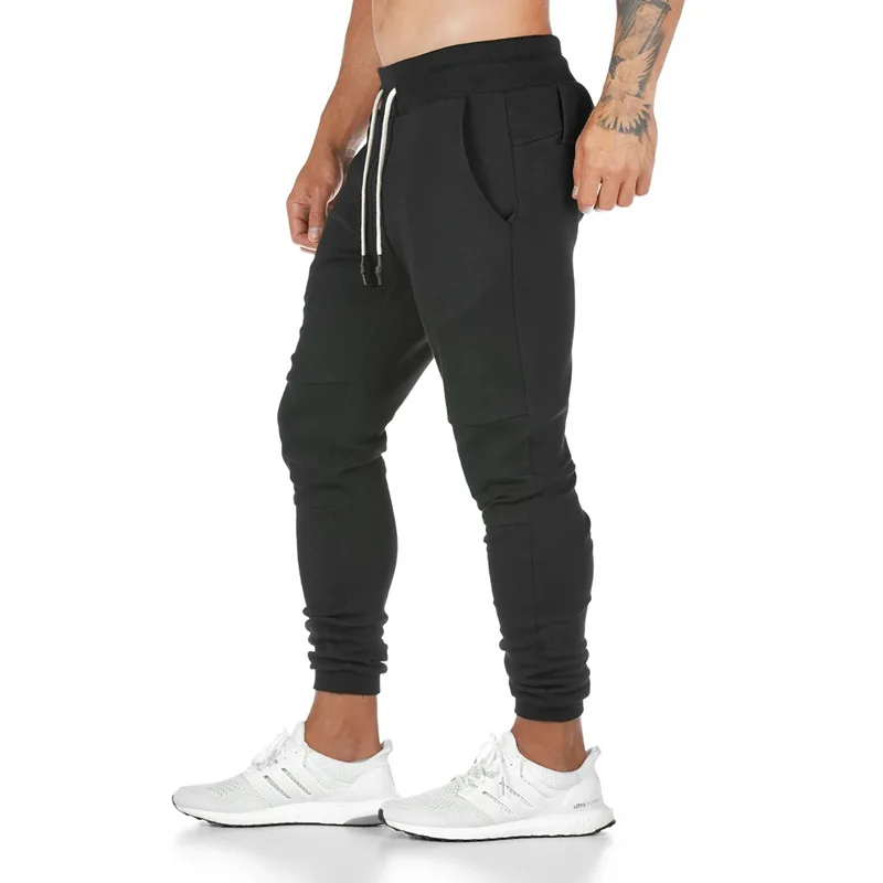 Pantaloni da jogging ad asciugatura rapida mimetici pantaloni sportivi da uomo pantaloni sportivi da Bodybuilding pantaloni da palestra pantaloni da