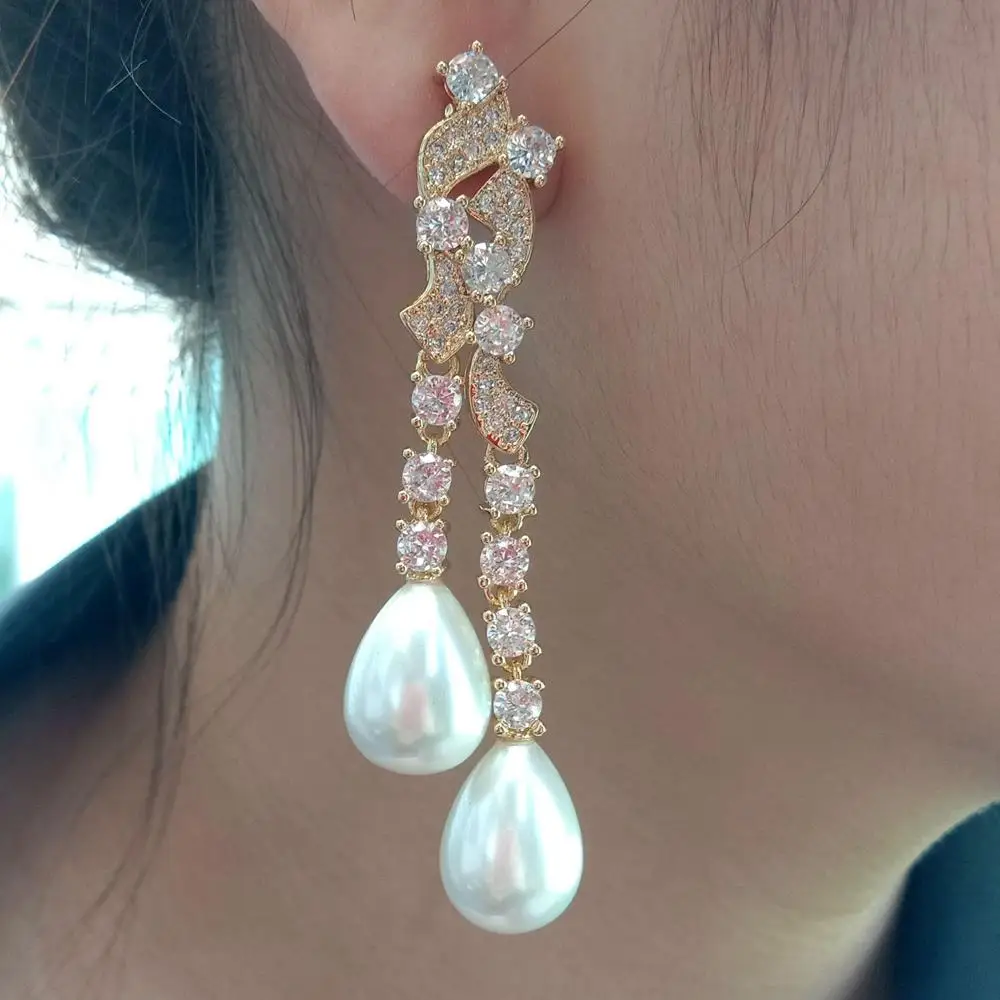 

Teardrop White Sea Sell Pearl Cz pave Yellow Gold color Plated Stud Earrings