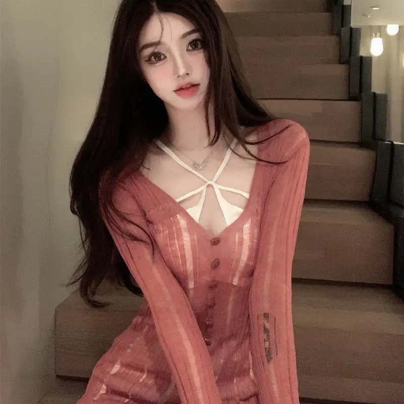 

Knitted dress feminine V-neck tight Hip Wrap short skirt 2021 autumn new pure spice girl long sleeve skirt